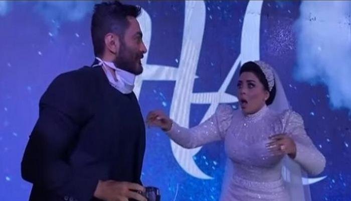 تامر حسني يفاجئ عروسين بطريقة جديدة